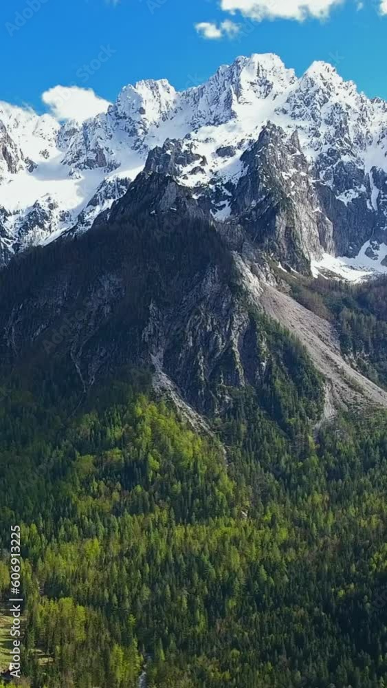 Aerial view on mountains in Triglav national park in Slovenia at spring. Vertical video Aerial view on mountains in Triglav national park in Slovenia at spring. Vertical video