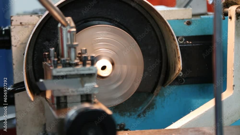 lathe machine in a workshop, Part of the lathe and operation by technician, Support modify work of the machine part or auto part. lathe machine in a workshop, Part of the lathe and operation by technician, Support modify work of the machine part or auto part.