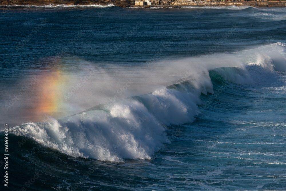 Rainbow over a wave, Sydney Australia