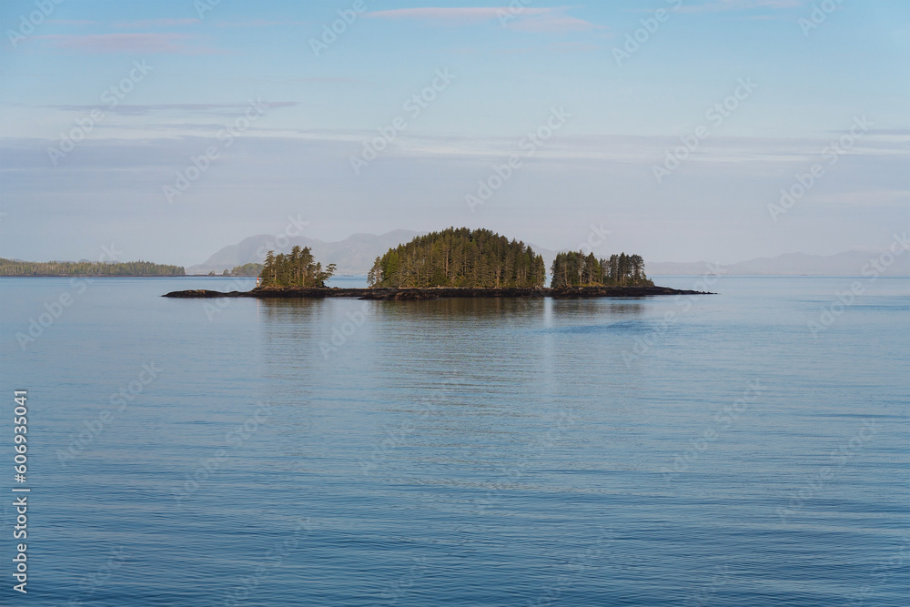 Lost islands at sunrise along Inside Passage Cruise, British Columbia, Canada. Lost islands at sunrise along Inside Passage Cruise, British Columbia, Canada.