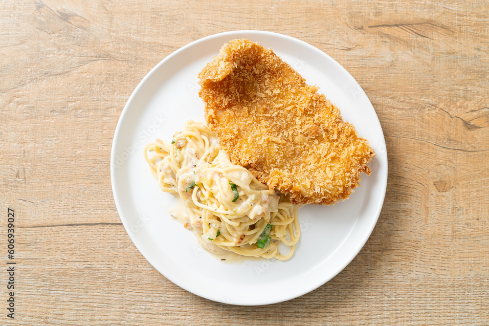 spaghetti pasta white cream sauce with fried fish spaghetti pasta white cream sauce with fried fish
