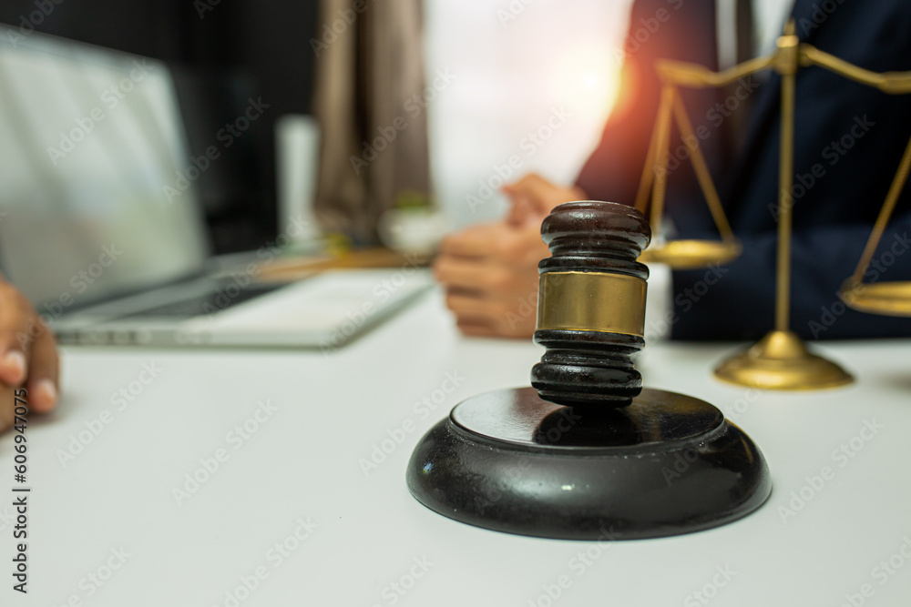 team meeting.businessman discussing legal legislation at law firm. judge gavel team meeting.businessman discussing legal legislation at law firm. judge gavel
