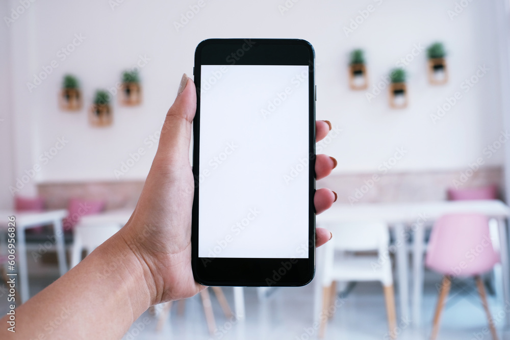 Women hands holding cell telephone blank copy space screen. smart phone with technology concept Women hands holding cell telephone blank copy space screen. smart phone with technology concept