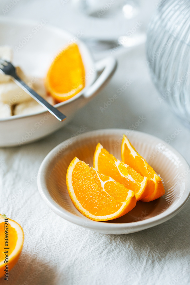 Orange milk pastry, baked pastries, fresh oranges and milk pastry on the table Orange milk pastry, baked pastries, fresh oranges and milk pastry on the table