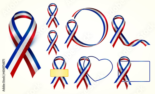 The red, white, & blue ribbon symbolizes American patriotism, 9/11 remembrance, military support. Also Used in Omaha after the Millard South High School shooting. 