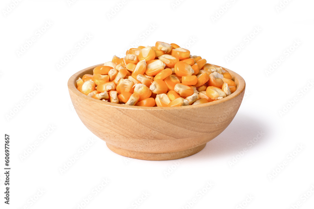 Dry corn seeds (raw popcorn grains) in wooden bowl isolated on white background with clipping path. Dry corn seeds (raw popcorn grains) in wooden bowl isolated on white background with clipping path.
