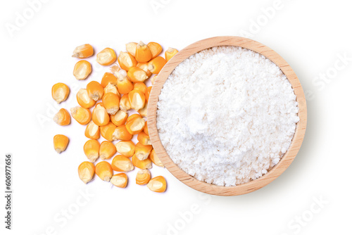 Corn starch in wooden bowl and dry corn seeds isolated on white background. Top view. Flat lay. photo