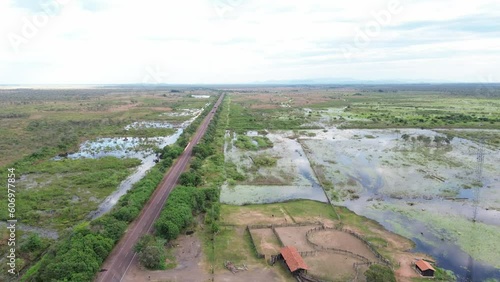 Flooded rural farm at pantanal in Brazil. Aerial dolly out photo