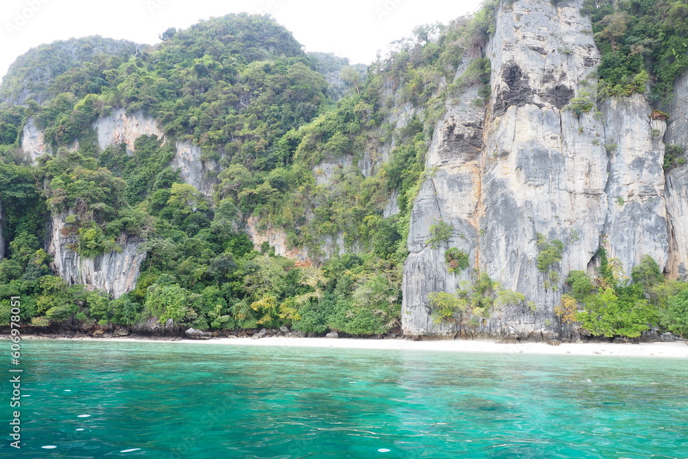 Beautiful paradise island view with clear water and white sand beach for natural view and landscape Beautiful paradise island view with clear water and white sand beach for natural view and landscape