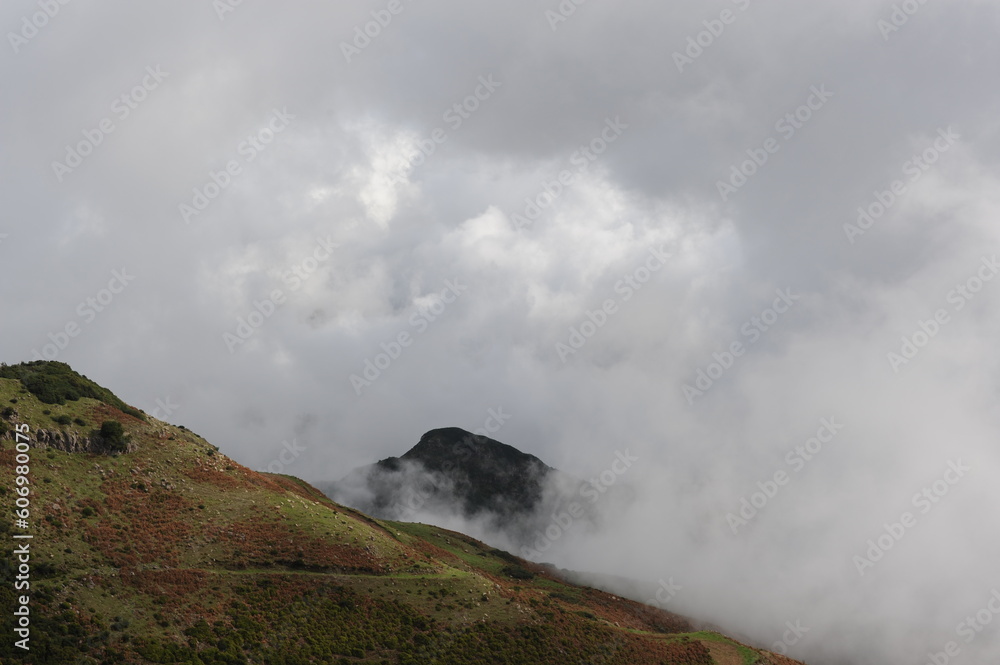 Cloudscape. Mountain range and peaks covered in clouds, fog and mist on Madeira Island , Portugal, Europe