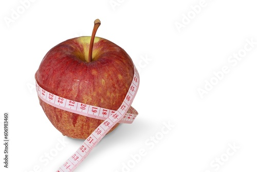 Apple with tape measure isolated on white background with clipping path. Healthcare and medical concept.