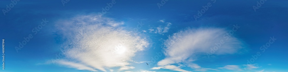 Sunset sky panorama with bright glowing Cirrus clouds. HDR 360 seamless spherical panorama. Full zenith or sky dome for 3D visualization, sky replacement for aerial drone panoramas.