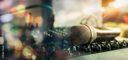 Close-up microphone and sound mixer in studio for sound record control system and audio equipment and music instrument. high quality dynamic microphone connect with male xlr connector. © Puttachat
