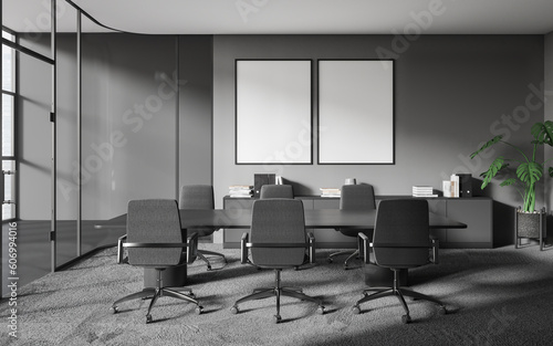 Dark gray office meeting room interior with posters