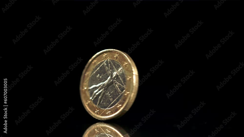 One coin spins around its axis. Filmed is slow motion 1000 fps. High quality FullHD footage One coin spins around its axis. Filmed is slow motion 1000 fps. High quality FullHD footage