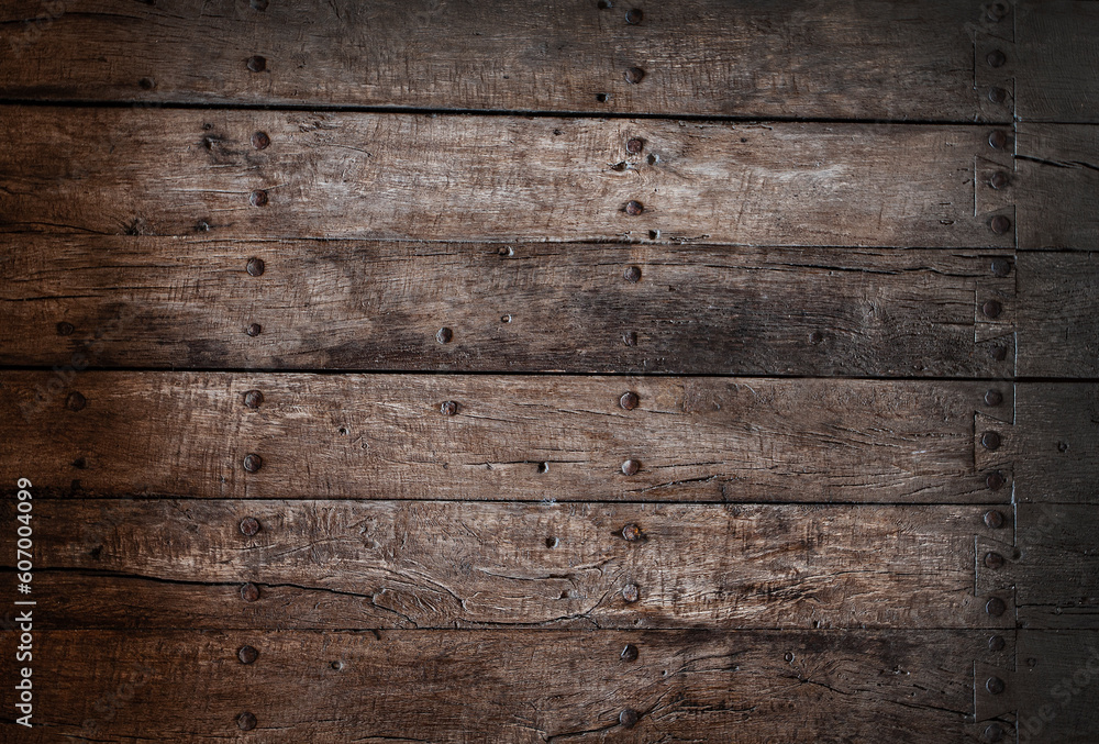 Fototapeta premium Old cracked paint on wooden planks. Selective focus