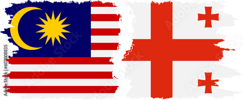 Georgia and Malaysia grunge flags connection vector