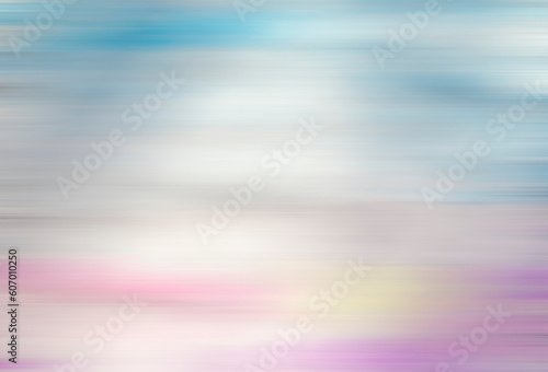 Abstract, beautiful design in a blurry motion of pink, white, blue and yellow.
