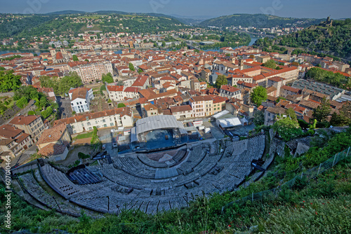 VIENNE, FRANCE, May 26, 2023 : General view of the city center, roman theater and hills surrounding the Rhone river valley.
