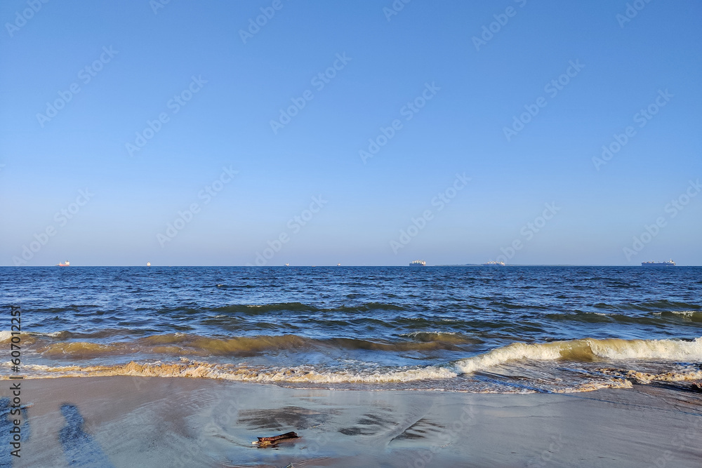 Tropical beach and blue sky landscape. View of beautiful sea on a sunny day.