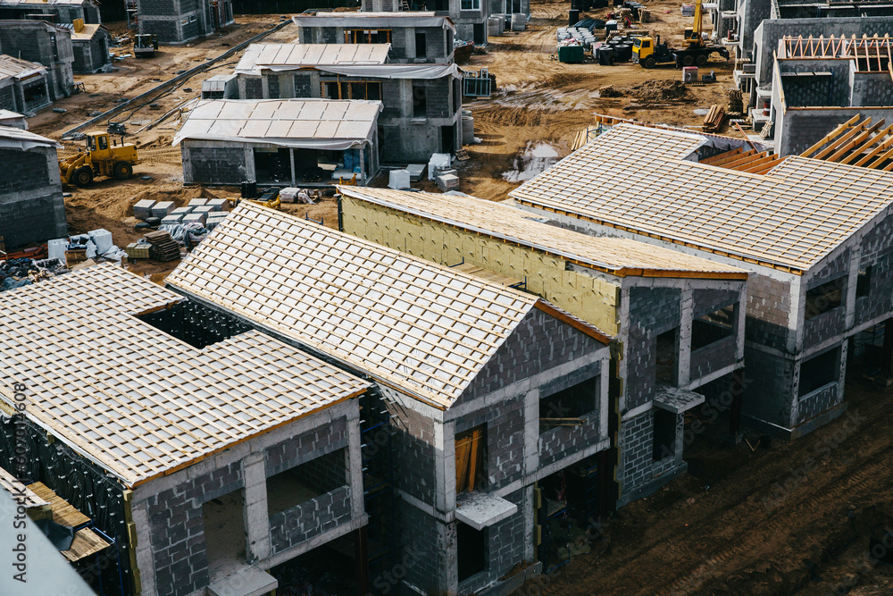 Construction site of European residential complex of apartment buildings. Outdoor facilities. Eco-friendly living in city. Modern block of flats. Scandinavian architecture