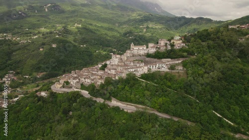 Little typical village up a mountain and green valley in the Abruzzo region of Italy