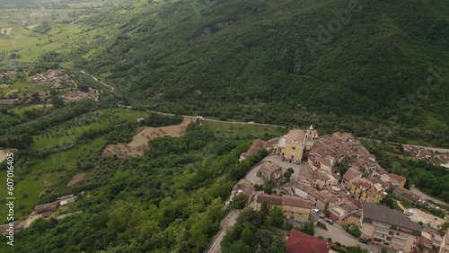 Little typical village up a mountain and green valley in the Abruzzo region of Italy