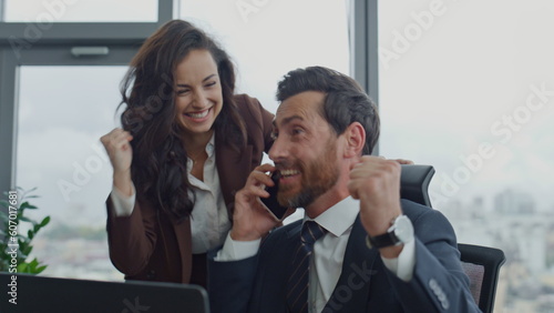 Business partners giving five celebrating professional success laughing close up