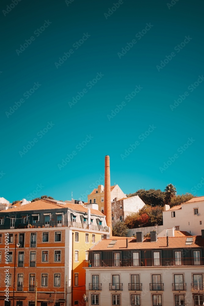 Fototapeta premium Vertical of old medieval rooftop european city landmark Lisbon, Portugal