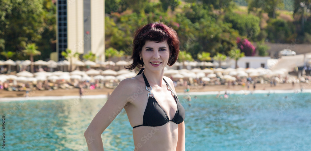 Beautiful slim brunette beach holiday. Beautiful slim brunette beach holiday.