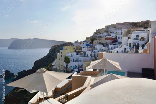 Fototapeta Naklejka Na Ścianę i Meble -  Beautiful shot of typical white buildings by the beach in Santorini, Greece