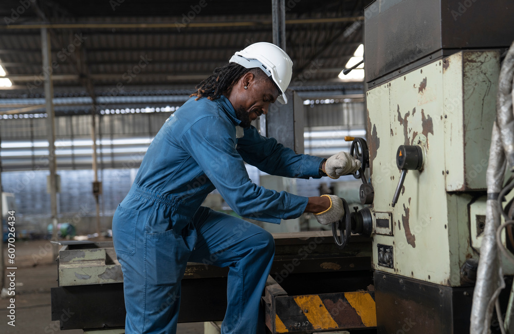 African engineer at factory