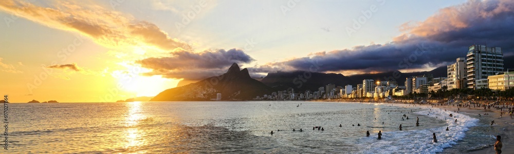 Panoramic shot of a beautiful sunset over Ipanema beach in Rio de Janeiro, Brazil.