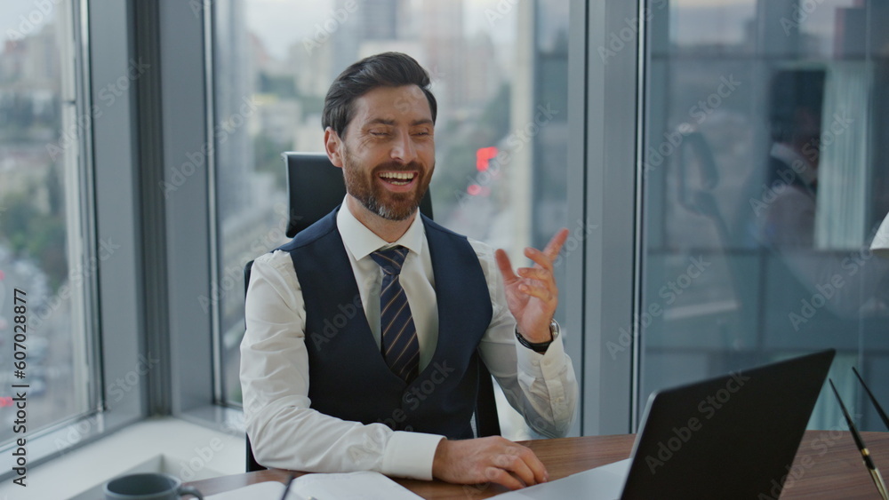 Worker speaking virtual meeting with colleagues remotely sitting modern office. Worker speaking virtual meeting with colleagues remotely sitting modern office.