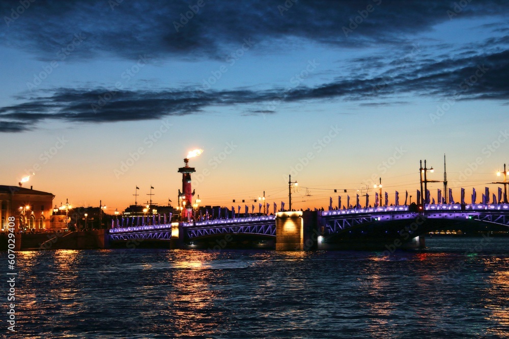 Magical Sankt Petersburg city illuminated at night and the Neva river