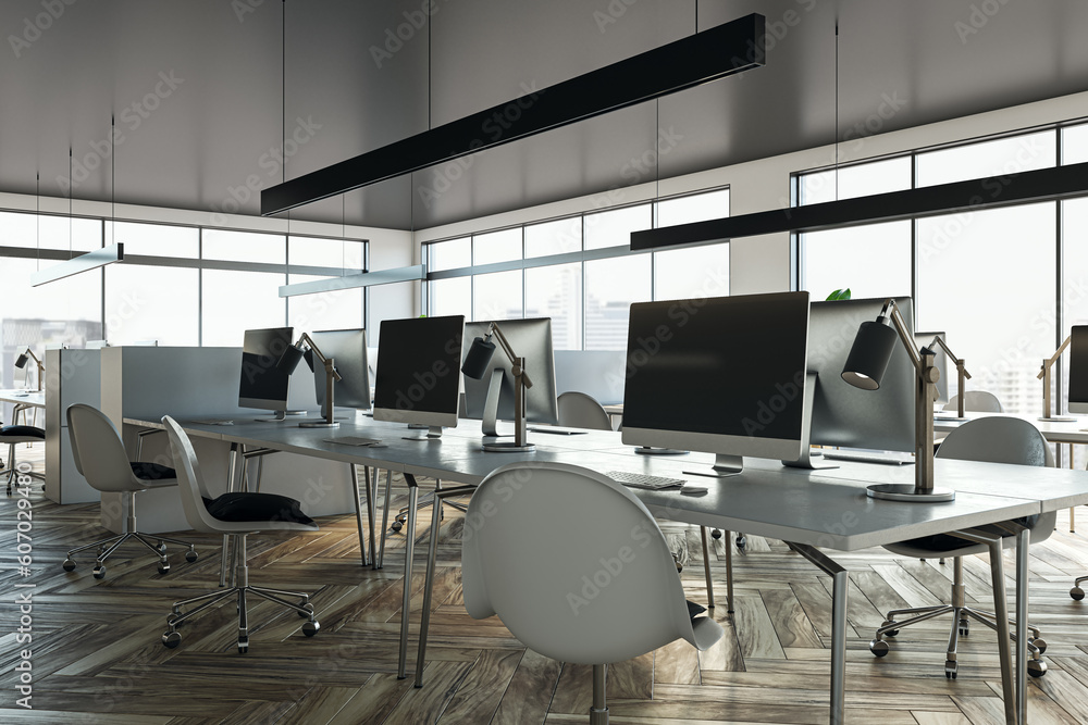 Luxury coworking office interior with furniture, equipment and panoramic window with city view and daylight. 3D Rendering.