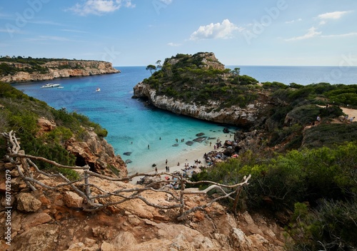 Aerial view of sea surrounded by cliffs