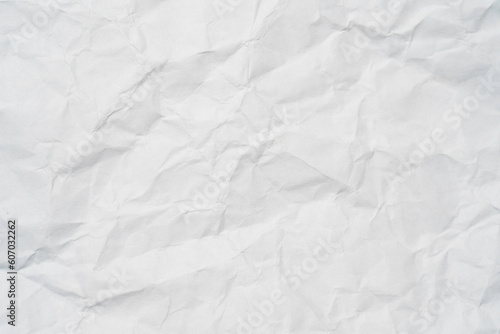 Closeup of white crumpled paper for texture background.