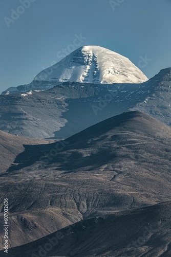 Vertical shot of the snowy Mount Kailash in Taqin County, Ali Prefecture, Tibet, China