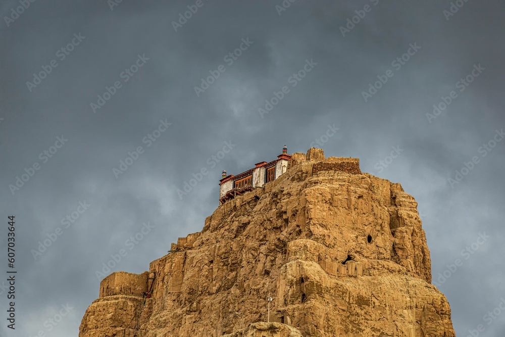 Ruins of the historic Guge Kingdom with ancient buildings on a rock in Zada Country, Tibet