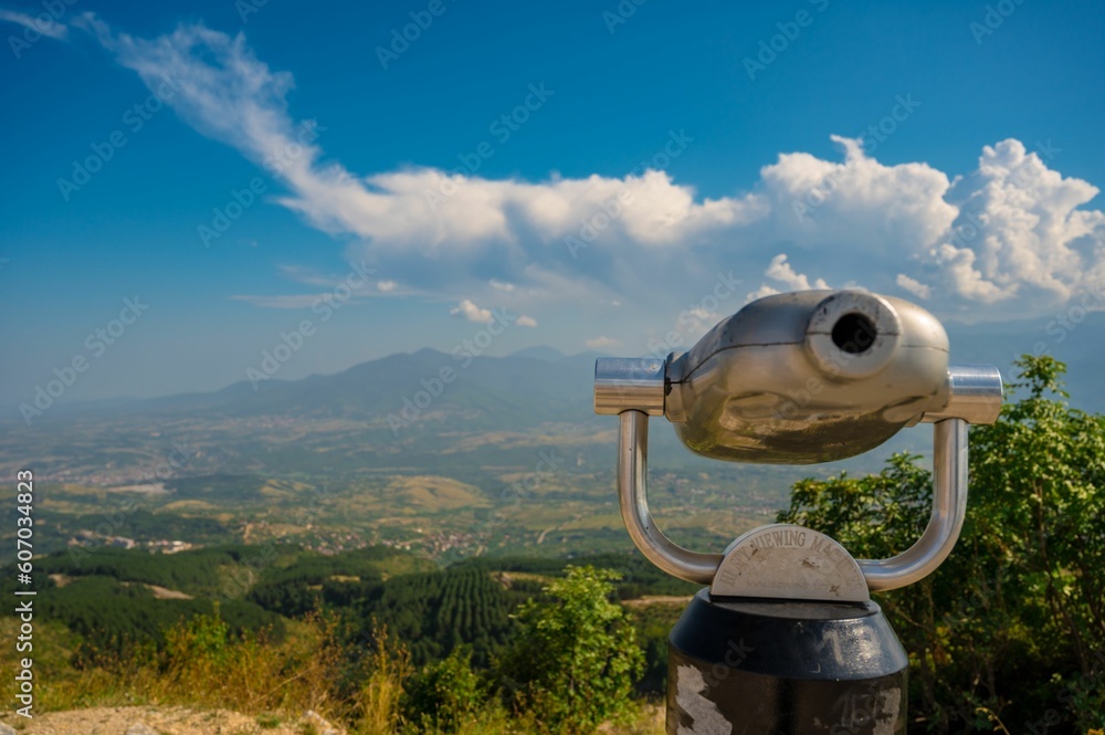 Coin binocular overlooking the beautiful landscapes and Vodno mountain near Skopje, North Macedonia