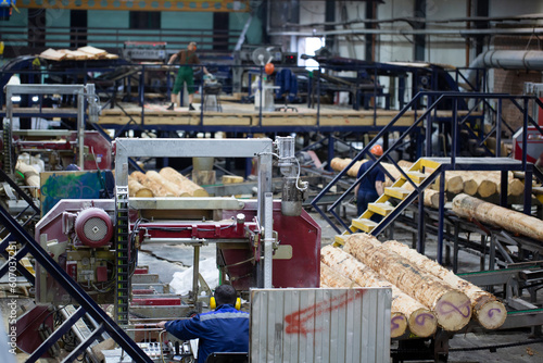 Fotografia Industrial plant sawmill - production of wooden boards with modern machines