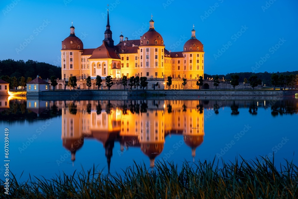 Moritzburg Castle in the evening in Saxony, Germany Moritzburg Castle in the evening in Saxony, Germany
