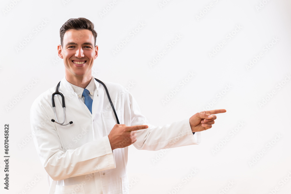 Portrait of young doctor pointing. Portrait of young doctor pointing.