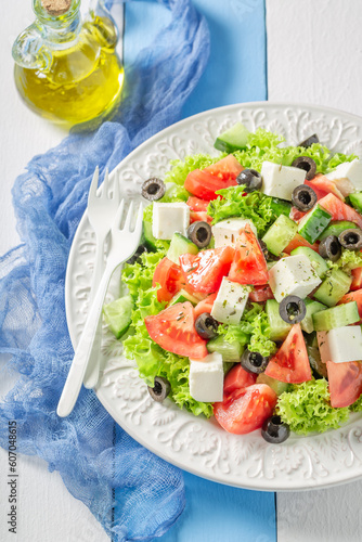 Diet and tasty Greek salad with tomatoes  cheese and lettuce.