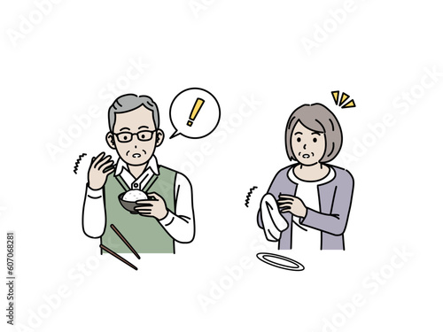 手や腕が痺れて物を落とす高齢者、老夫婦