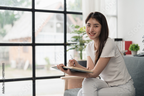 Attractive Asian woman resting comfortable living room and reading book, Relax, Sofa, Lifestyle Free Download Attractive Asian woman resting comfortable living room and reading book, Relax, Sofa, Lifestyle - GFXLoad