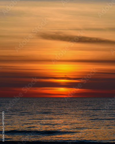 Spectacular bright golden sunset over Baltic sea