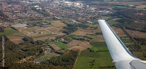 Photography Plane flying over Amsterdam airport area, View out of airplane w