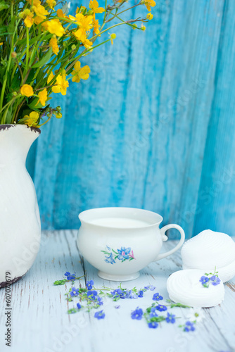 Wallpaper Mural Cute cup with milk and sweet marshmallow desserts. Bouquet of wild flowers. Vintage style photo. summer relaxed mood. Torontodigital.ca